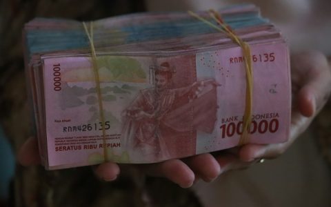 Uang rupiah sebagai ilustrasi berita ekonomi dan stimulus nasional